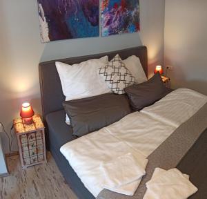 Un pat sau paturi într-o cameră la Schlafort