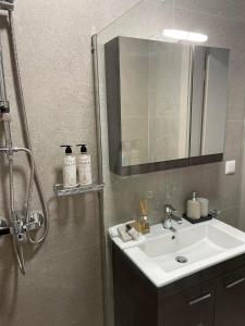 Koupelna v ubytování Morpheus boutique apartment + 37 fotografií