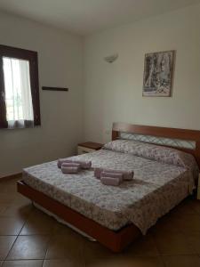 Postel nebo postele na pokoji v ubytování Veliero House