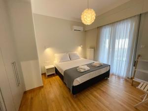 En eller flere senge i et værelse på Iris