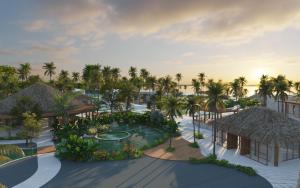 een luchtzicht op een resort met een zwembad bij Secrets Playa Blanca Costa Mujeres - All Inclusive Adults Only in Cancun