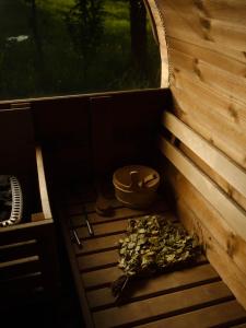 an inside view of a sauna with a bowl and a bowl at Backyard Village in Hveragerði