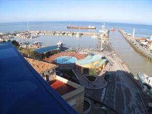 a view of a marina with boats in the water at Residence Darsena in Cattolica