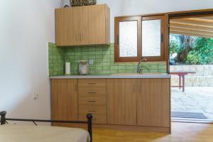 Kuchyň nebo kuchyňský kout v ubytování Eucalyptus Villa