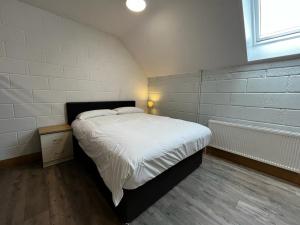 Postel nebo postele na pokoji v ubytování Achill Surf Centre