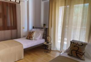 Postel nebo postele na pokoji v ubytování Eucalyptus Villa
