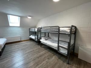 Postel nebo postele na pokoji v ubytování Achill Surf Centre