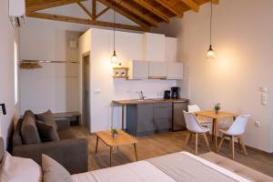 Kuchyň nebo kuchyňský kout v ubytování Olivar Suites
