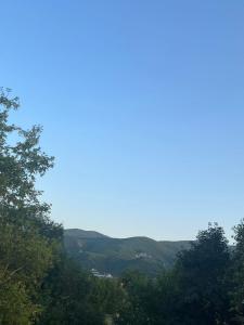 a view of trees and mountains in the distance at Saint George in Strumica