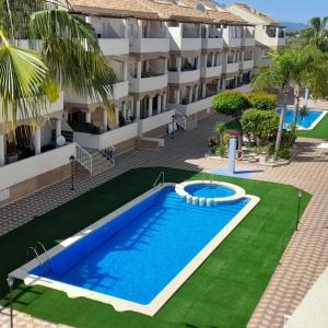 an image of a swimming pool in front of a building at PLAYA SOL COSTA NORTE VINARÒS in Vinarós