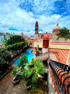 a view of a river from the roof of a building at Concepción Hotel Boutique - Adults Only in San Miguel de Allende