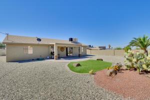 a house with some animals in the front yard at Pet-Friendly Arizona Abode Near Beaches and Golfing! in Lake Havasu City