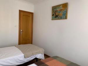 Postel nebo postele na pokoji v ubytování Sueca 1