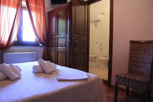 Letto o letti in una camera di Rifugio Fasanelli