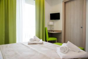 Postel nebo postele na pokoji v ubytování Hotel Solemare - Frontemare - 3 Stelle Superior