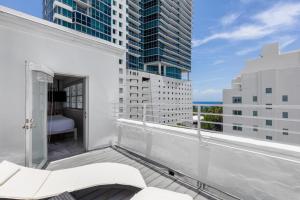 a balcony with a view of a building at Townhouse Hotel, BW Signature Collection in Miami Beach +23 photos