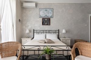 Postel nebo postele na pokoji v ubytování La dimora di Caboto B&B