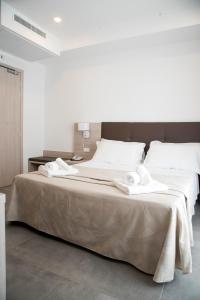 Postel nebo postele na pokoji v ubytování Hotel Solemare - Frontemare - 3 Stelle Superior