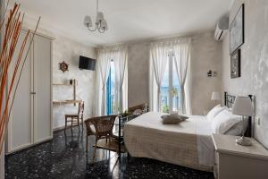 Postel nebo postele na pokoji v ubytování La dimora di Caboto B&B
