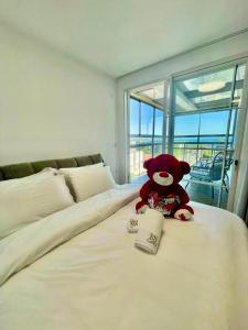 Suite In White客房内的一张或多张床位