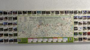 a large map hanging on a wall at Pokoje w Gołdapi in Gołdap