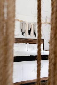Postel nebo postele na pokoji v ubytování Hotel Rocaval San Cristóbal de las Casas