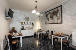 TV a/nebo společenská místnost v ubytování La dimora di Caboto B&B