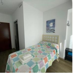 Posteľ alebo postele v izbe v ubytovaní Albergue-Pensión Cabo da Vila