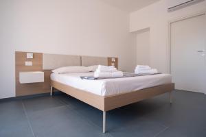 Voodi või voodid majutusasutuse Nautika Suites toas