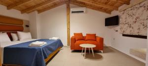 Postel nebo postele na pokoji v ubytování Chasapis Luxury Studios & Apartments