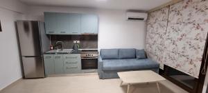 Kuchyň nebo kuchyňský kout v ubytování Chasapis Luxury Studios & Apartments