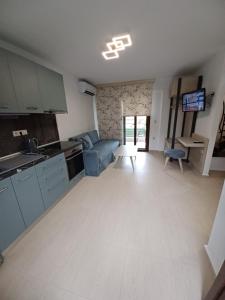 Kuchyň nebo kuchyňský kout v ubytování Chasapis Luxury Studios & Apartments