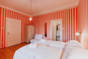 A bed or beds in a room at Villa Mimi