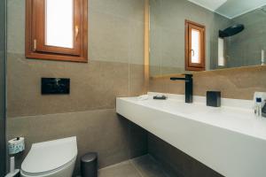 Koupelna v ubytování Loukia Apartments