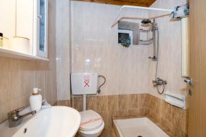 Kúpeľňa v ubytovaní Golden Sunset Beach Apartment