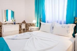 Posteľ alebo postele v izbe v ubytovaní Golden Sunset Beach Apartment