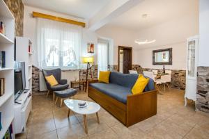 Posedenie v ubytovaní Golden Sunset Beach Apartment