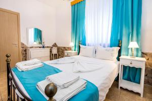 Posteľ alebo postele v izbe v ubytovaní Golden Sunset Beach Apartment