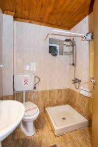 Kúpeľňa v ubytovaní Golden Sunset Beach Apartment