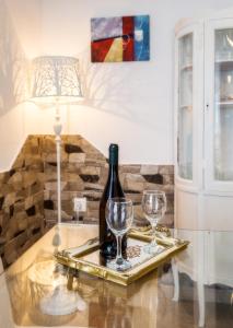 Nápoje v ubytovaní Golden Sunset Beach Apartment