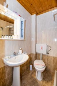Kúpeľňa v ubytovaní Golden Sunset Beach Apartment