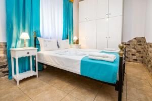 Posteľ alebo postele v izbe v ubytovaní Golden Sunset Beach Apartment