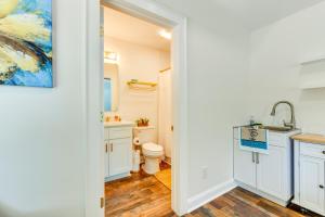 a bathroom with a toilet and a sink at Charming Winston-Salem Studio on Miller Park! in Winston-Salem