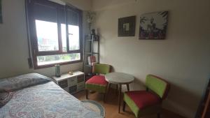 Postel nebo postele na pokoji v ubytování GAIA Hab doble con baño compartido