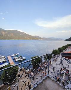 a view of a large body of water from a balcony at Residenza Il Gabbiano 3 in Cannobio