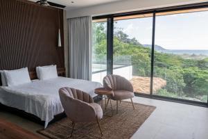 Postel nebo postele na pokoji v ubytování Villa Setai - Full Ocean view + 49 fotografií
