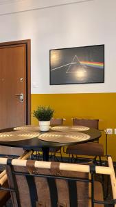 a meeting room with tables and chairs and a rainbow at Athenian Vintage Style 2 bdr apartment in Athens