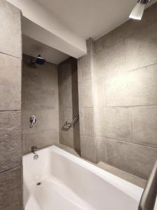 Een badkamer bij Hotel Grand Maria