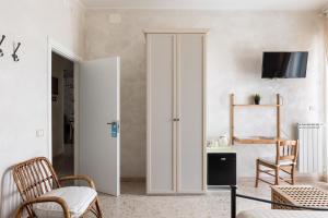 TV a/nebo společenská místnost v ubytování La dimora di Caboto B&B
