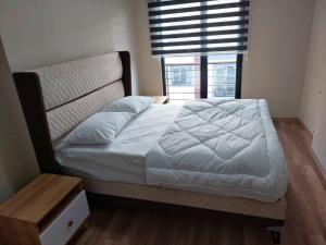 Ένα ή περισσότερα κρεβάτια σε δωμάτιο στο Rental Aparts in Yomra
